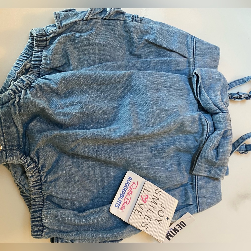 Ruffle Butts one piece baby 6-12 mos. New with tags.